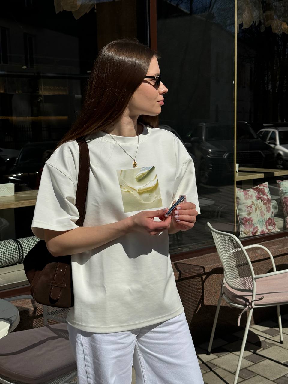 Футболка молочна з принтом